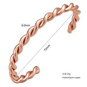 Rose gold twisted copper open bangle bracelet with 6mm width and 75mm diameter design.