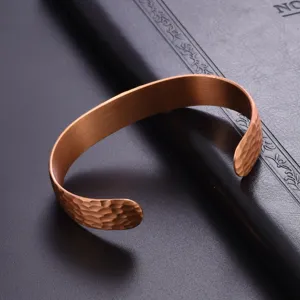Exquisite hammered copper cuff bracelet with open adjustable design, perfect daily jewelry detail.