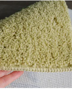 Verdichtete saugfähige Fußmatte Detailansicht mit weichem Schlingenflor und sauberer Kantenbindung.