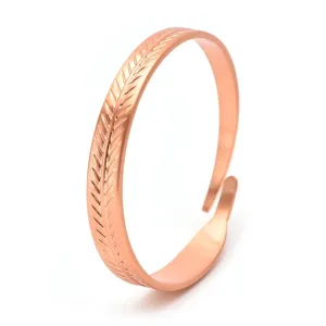 Rose copper open cuff bracelet featuring delicate feather leaf texture detail for daily wear.