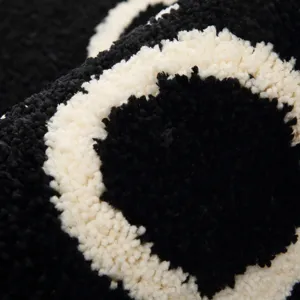 Black and white wavy plush bedside rug, thickened flocked floor mat for living room bedroom
