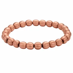 Detailed view of the solid copper beaded bracelet featuring a brushed vintage metallic finish.
