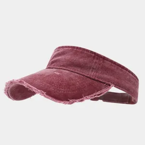 Detailed view of the washed distressed sun visor in dark red, showing frayed edge texture and fabric.