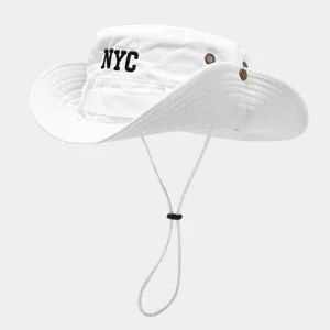 Close-up detail of white sun hat featuring NYC embroidery and adjustable chin drawstring.