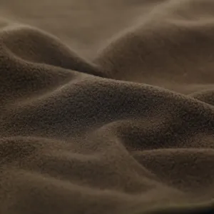 Detailed shot of soft brown fleece fabric, ideal for winter outdoor hat and mask making.