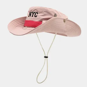 Pink outdoor sun hat with NYC embroidery, breathable fabric, and adjustable chin strap.