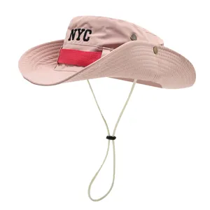 Pink outdoor sun hat with NYC embroidery, breathable metal eyelets, and adjustable chin strap.