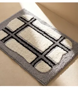 Detail view of nordic style plush bathroom mat with geometric grid design and anti slip backing.