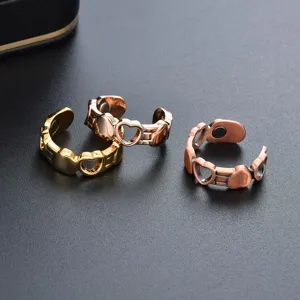 Fashion open magnetic health ring set featuring hollow heart designs in gold rose gold copper.
