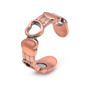 Double heart magnetic copper open ring for women fashion hollow jewelry close-up view