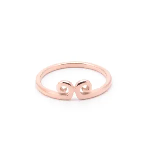 Close-up detail of the rose gold titanium steel open ring with creative headband motif.