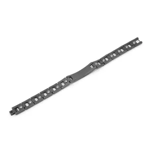 Close-up view of the dark titanium steel link bracelet showing magnetic stones and clasp detail.