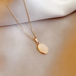 Elegant gold stainless steel oval white stone pendant necklace for women fashion jewelry main view