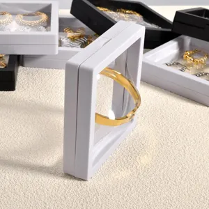 Transparent PE film floating jewelry display box detail showing secure storage for accessories.