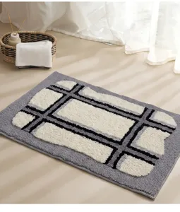 Thickened absorbent bath mat with geometric design, soft plush non-slip floor rug for home.