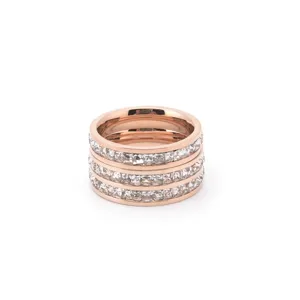 Detailed view of the multi-band rose gold stainless steel ring sparkling with clear crystals.
