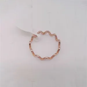 Minimalist wave ring in rose gold titanium steel, stylish and versatile everyday jewelry.