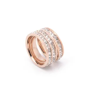 Close-up detail shot of rose gold multi-band crystal ring in stainless steel material