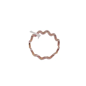 Minimalist rose gold titanium steel wavy ring, chic geometric fashion finger jewelry for women.