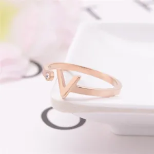 Fashion rose gold stainless steel V-shaped open ring with sparkling crystal for women daily wear.