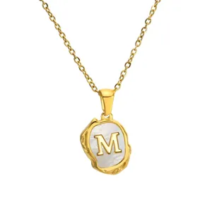 Gold stainless steel letter M necklace with mother of pearl pendant for women fashion.