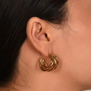 Gold multi-strand hoop earrings for women, minimalist C-shaped twisted fashion jewelry.