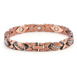 Detailed view of antique copper magnetic bracelet featuring leaf shapes and sparkling crystals.