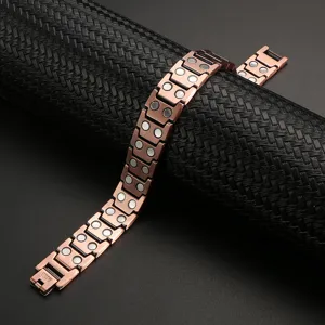 Detailed close-up of a copper magnetic therapy bracelet, showcasing link and embedded magnets.