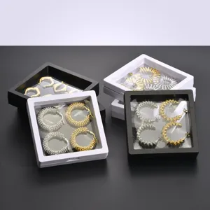 Transparent PE film jewelry storage boxes with metal hoop earrings display cases, anti-dust.