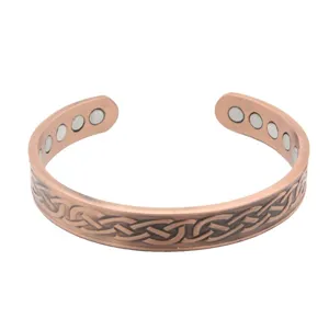 Antieke koperen magnetische open manchet armband voor heren met Keltische knoop
