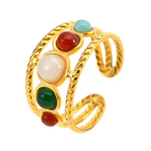 Stainless steel multi-layer geometric ring with colorful resin stones, retro design detail.