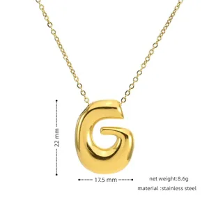 Close-up detail view of a gold 3D puffy letter G pendant necklace with clear dimensions.