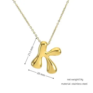 Gold stainless steel puffy letter K pendant necklace detail view, 21.5x20mm size.