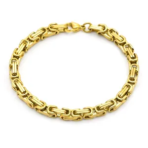 Close-up view of the golden stainless steel Byzantine chain bracelet showing fine links.