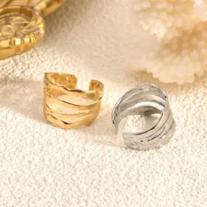 Stainless steel multi-strand irregular line ring detail closeup shot, retro minimalist style.