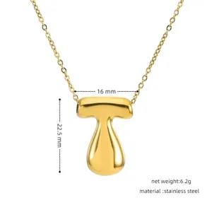 Gold stainless steel puffy letter T pendant necklace, elegant clavicle chain detail shot.