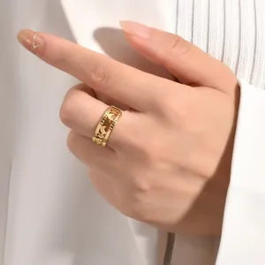Gold stainless steel hollow star moon ring close up detail shot for women fashion jewelry