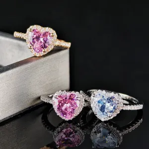 Stunning heart-shaped crystal rings featuring elegant pave settings, perfect romantic gifts for women.