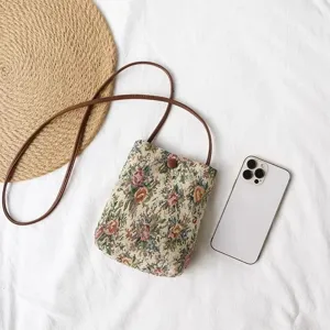 Retro floral tapestry crossbody bag with leather strap, small chic shoulder bag for women.