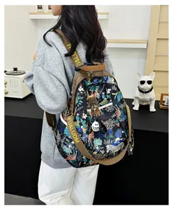 Stylish women printed backpack casual travel school daypack with durable fabric and straps.
