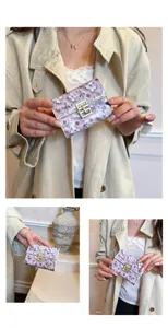 Detailed view of the cute floral printed PU leather card holder, showing the gold geometric clasp.