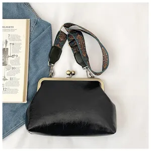 Retro kiss-lock shell shoulder bag PU leather crossbody bag with ethnic wide strap