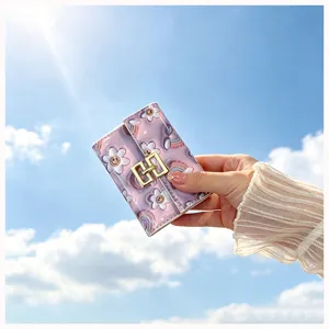 Cute floral printed PU leather card holder detail, compact folding coin purse for women.