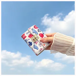 Cute printed PU leather card wallet, short folding coin purse, ins style card holder for women.