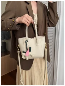 Borsa a secchiello minimalista coreana da donna, elegante borsa a tracolla in pelle.