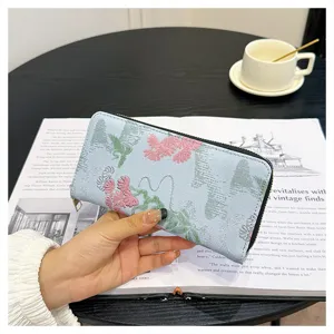 Portefeuille long pour femme avec broderie florale, grande capacité et fermeture éclair.