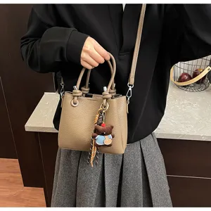 Korean style casual versatile bucket bag soft leather shoulder crossbody bag with cute bear charm