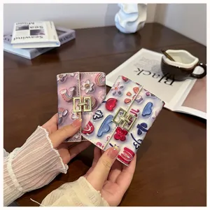 Cute printed PU leather card holder detail, multi-slot folding wallet with metallic clasp.
