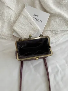 Retro PU leather kiss-lock shoulder bag, vintage shell crossbody purse with chain strap.