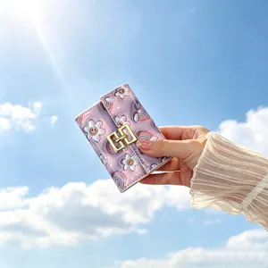 Cute PU leather card holder wallet for women, short folding coin purse with floral print.